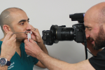 Fig 1. Photographing the patient with a white-balance Gray Reference Card.